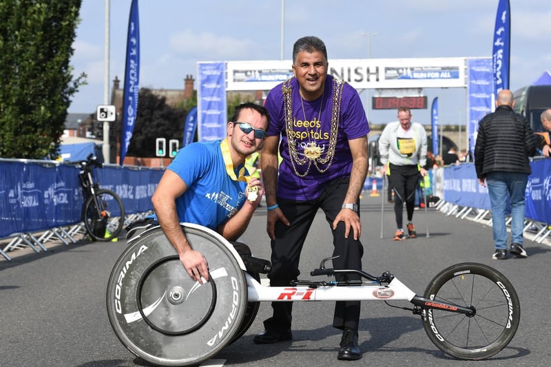 Pictured is the winner of the wheelchair race with Leeds Mayor Asghar Khan