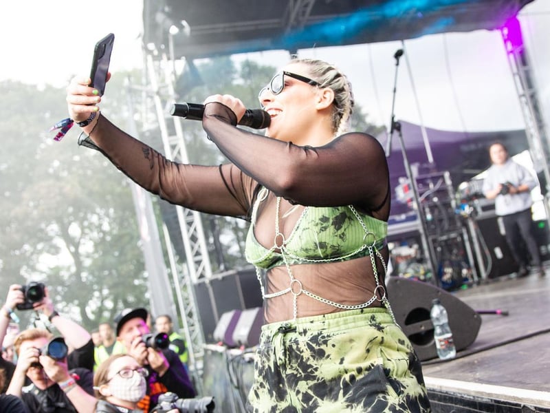 Janine Shilstone, of Scottish rock band Vukovi, takes a snap on The Key Club stage