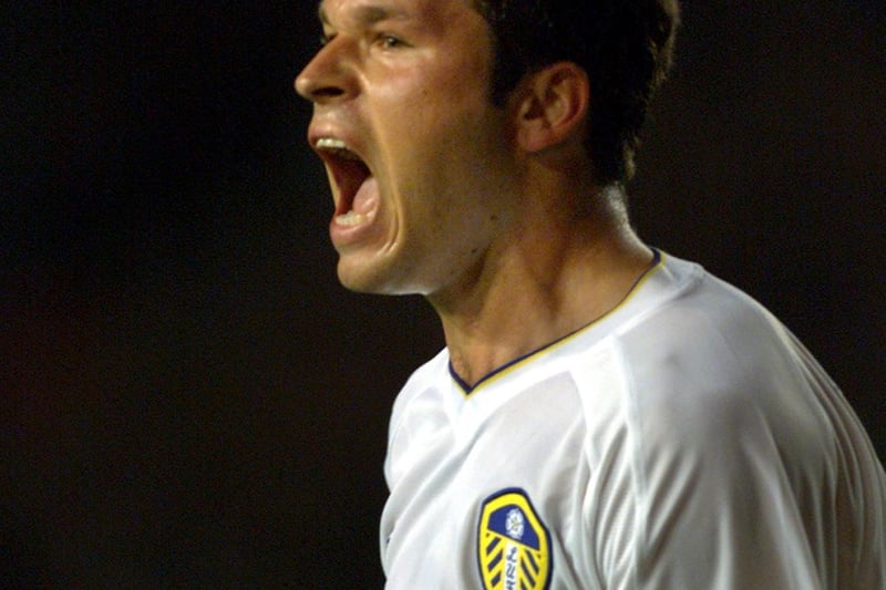 Striker Mark Viduka, back from Olympic duty with Australia, celebrates after scoring with a header after 12 minutes.