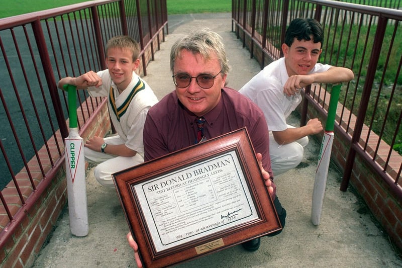 This is Australian exchange teacher, Dave Swann who was showing off a certificate signed by cricket legend Don Bradman. He is pictured withFarnley Park High School pupils Warren Brewer (left) and Andrew Punter.