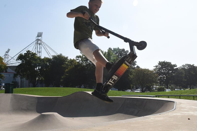 Harry, 12, on his scooter in Moor Park, Preston