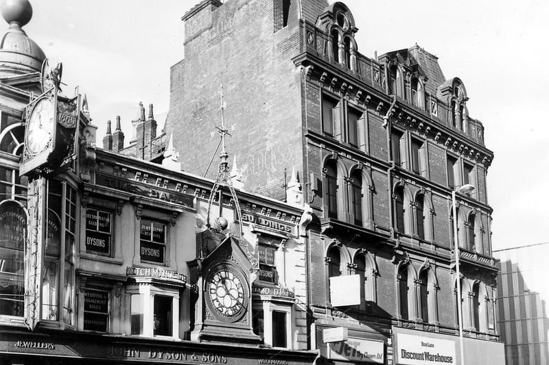 Briggate in January 1978 featuring John Dyson & Sons, Jewellers and Watchmakers, which has two ornate clocks, one displaying the year 1865 in which the business was founded.