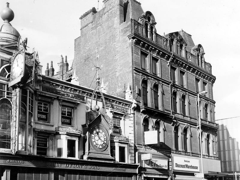 Briggate in January 1978 featuring John Dyson & Sons, Jewellers and Watchmakers, which has two ornate clocks, one displaying the year 1865 in which the business was founded.