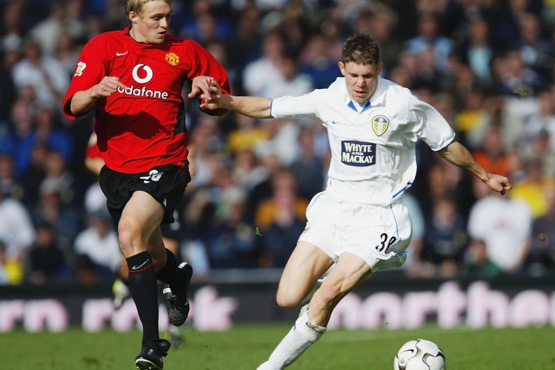 James Milner clashes with Manchester United's Darren Fletcher during the Premiership clash at Elland Road in October 2003.