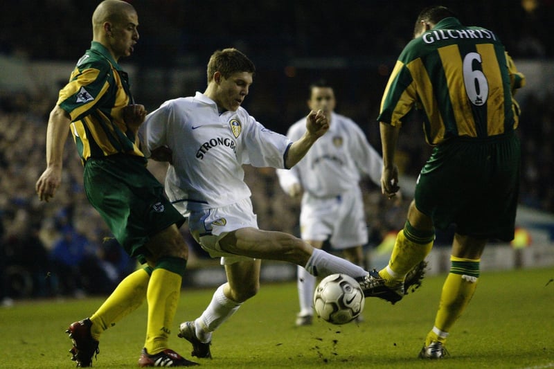 James Milner keeps possession despite the attention of West Brom's Phil Gilchrist and Neil Clement during the Premiership clash at Elland Road in January 2003. The game ended goalless.