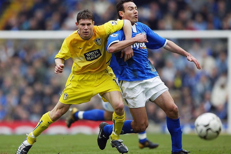 James Milner gets the better of with Birmingham City's Stan Lazaridis during the Premiership clash at St. Andrew's in March 2004.