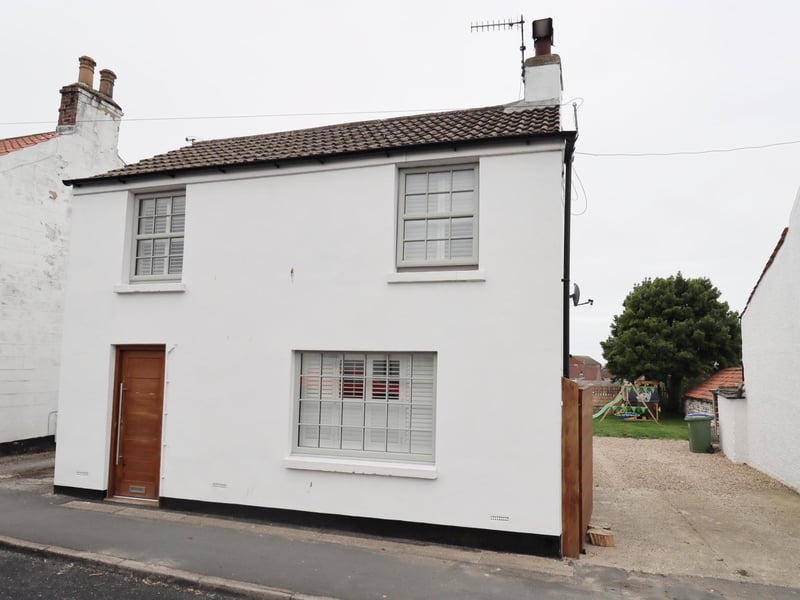 This village centre home has open plan living space, ideal for a family