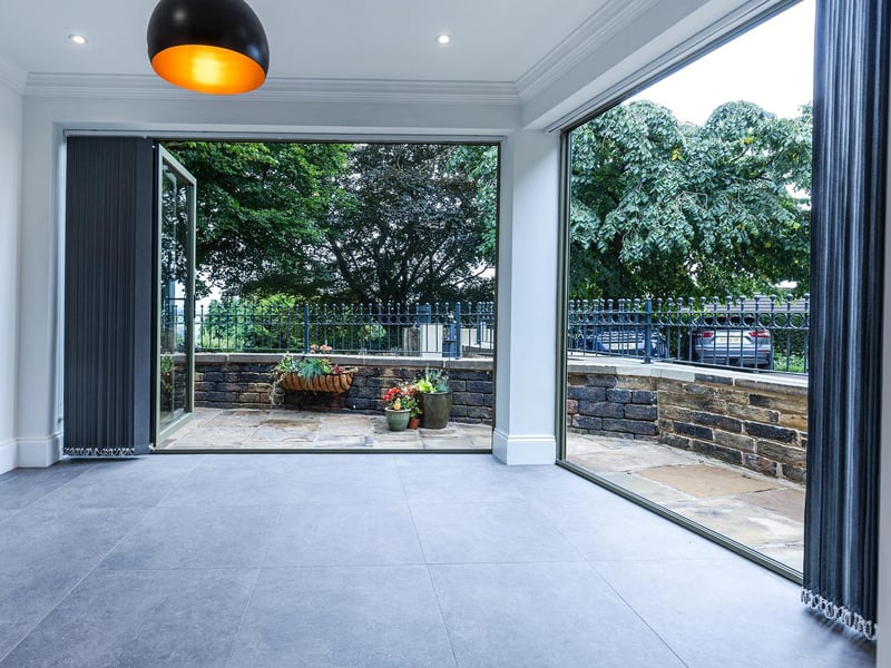 Folding doors allow freedome of movement, from inside to out.