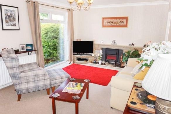 This home is described as a Tardis by the current owners and that is certainly true. The lounge is one of three living/reception areas. It has a large picture window looking across  the front garden and has a door to the rear hall and to the Sitting Room.