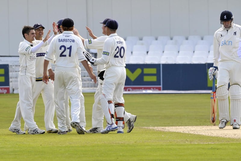 The Yorkshire players celebrate a wicket