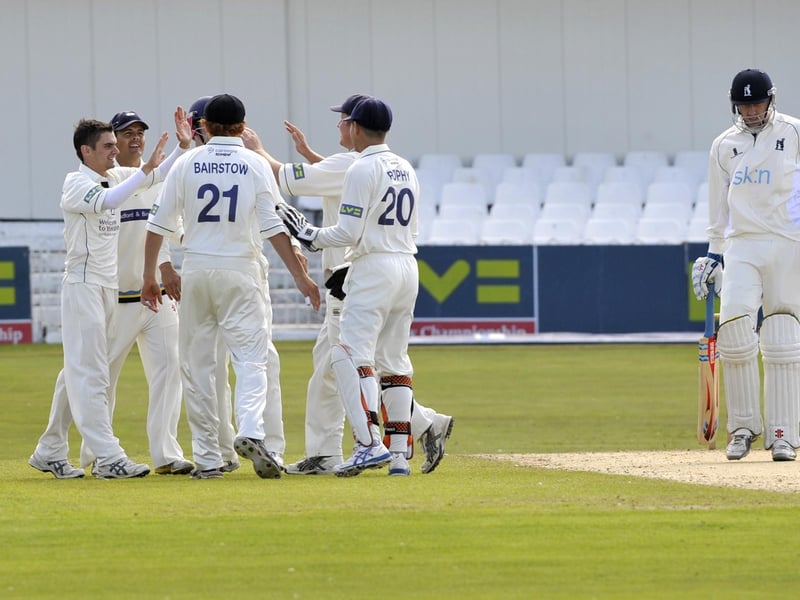 The Yorkshire players celebrate a wicket