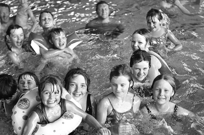 Fun at Hindley pool during the long hot summer of '76 .