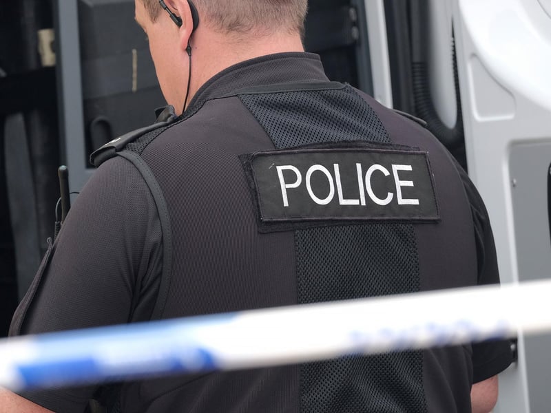 Officers carry out their investigations.