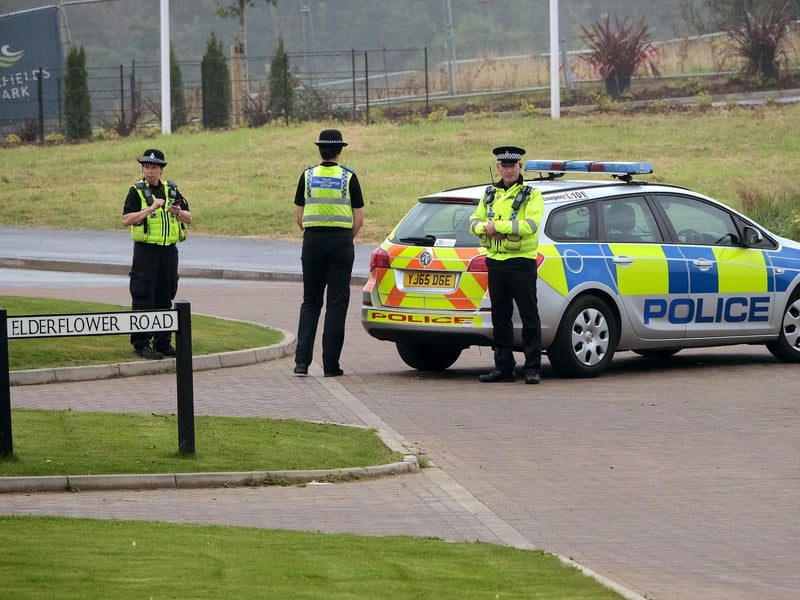 The police cordon.
