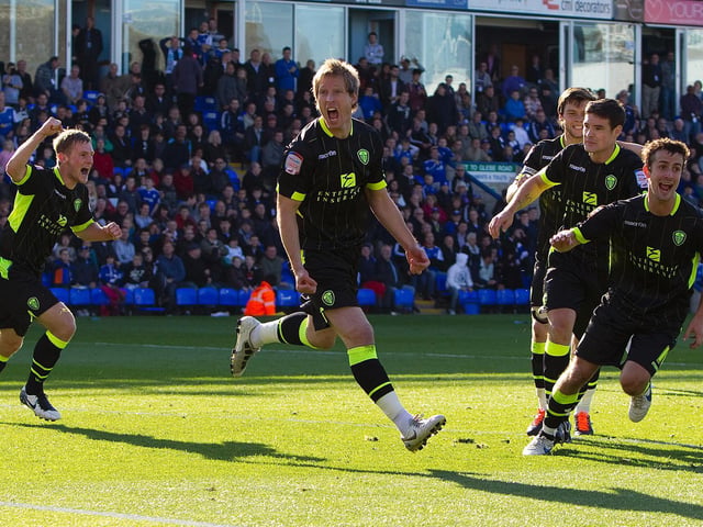 You don’t see many black kits in football. You couldn’t miss this one though, jazzed up with pinstripes and fluorescent accents. Is it lime, or highlighter yellow? You decide.
Another wacky feature which has made a recent comeback in the day-glo adidas stripes of the 2021/2022 home kit.