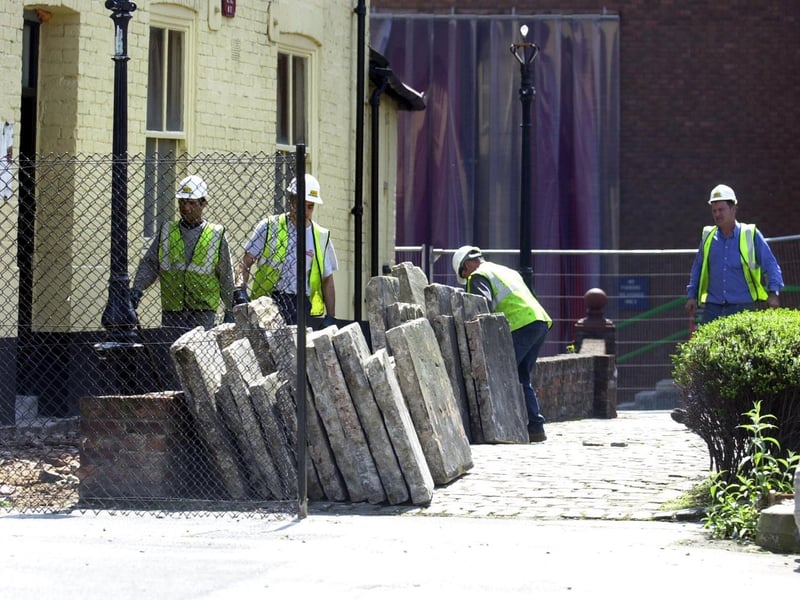 May 2002 and workmen move in to knock down the Duke William pub in the grounds of Tetley's Brewery.