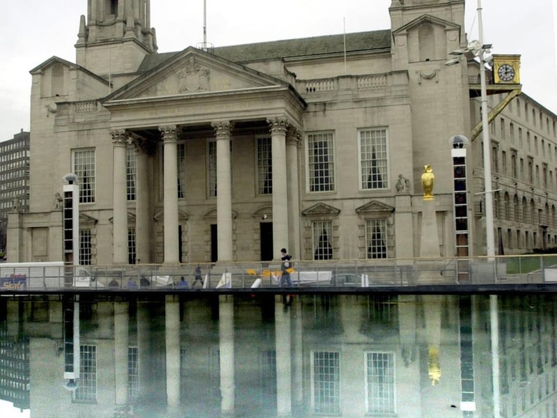 January 2002 and Leeds Civic Hall is reflected in the ice as Millennium Square, prepared the host the Ice Cube attraction.
