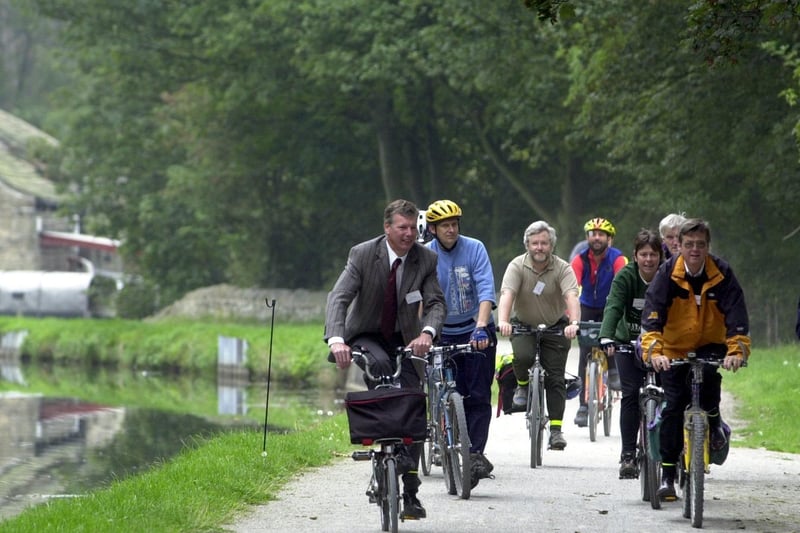 Supporters ride along the newly-restored Leeds Liverpool Canal towpath between Leeds and Saltaire in September 2002.