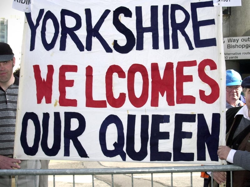 Philip Baxter, left, and Colin Holt from the Yorkshire Ridings Society wait to meet Her Majesty The Queen as she arrives on her jubilee tour at Leeds City Station in July 20002.