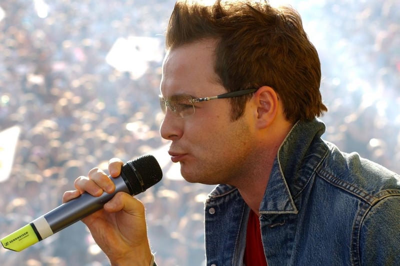 Westlife's Shane Filan belts out a hit during the Party in the Park  music extravaganza in July 2002.