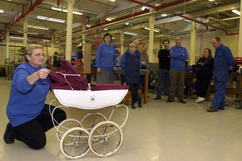 Christine Robinson of quality control with the last Silver Cross pram to be made at the factory in Guiseley in November 2002.