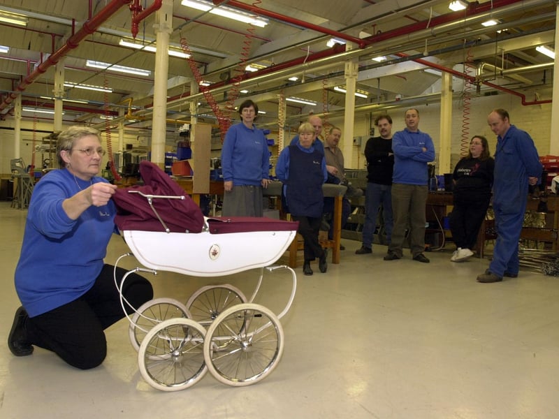 Christine Robinson of quality control with the last Silver Cross pram to be made at the factory in November 2002.