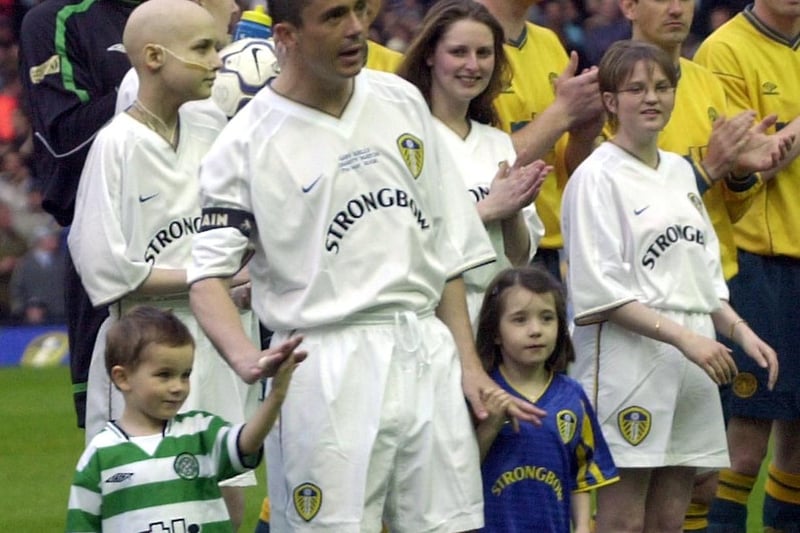 Leeds United played Glasgow Celtic for Gary Kelly's testimonial in May 2002. He is pictured  with his children Laura and Lee.