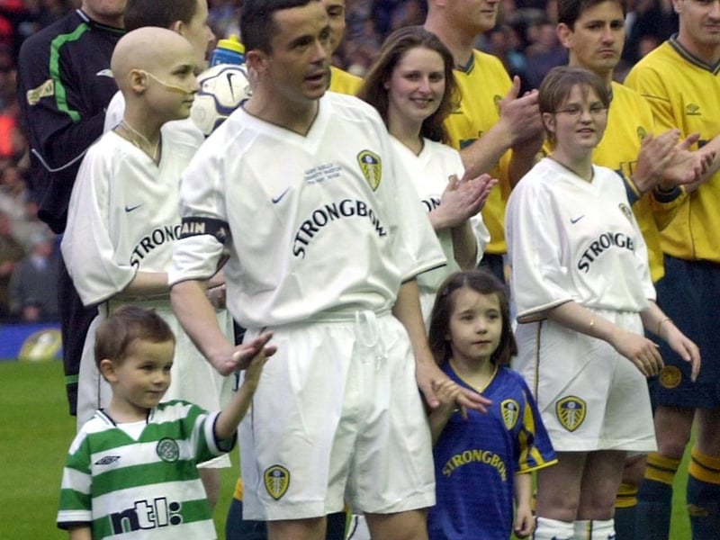 Leeds United played Glasgow Celtic for Gary Kelly's testimonial in May 2002. He is pictured  with his children Laura and Lee.