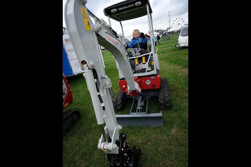 Otis Weld-Blundell tries a digger for size.