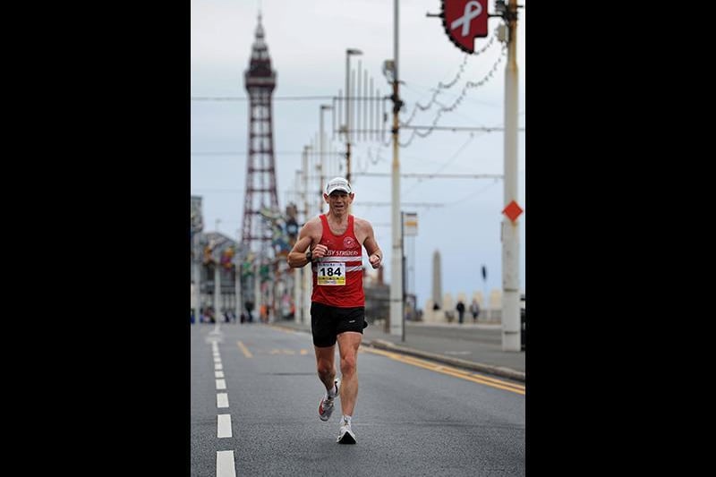 Runners take part in the Blackpool Half and Full Marathon along the promenade in Blackpool on Sunday.