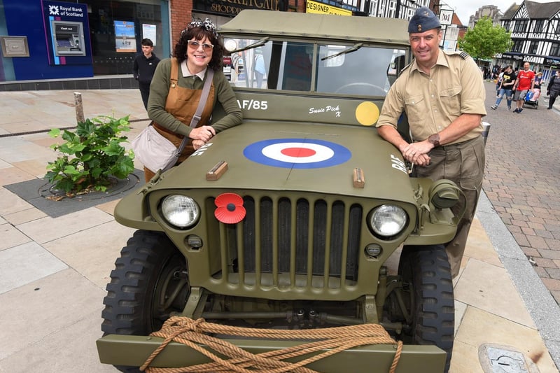 Susan and Gary Boyd with their vintage vehicle.