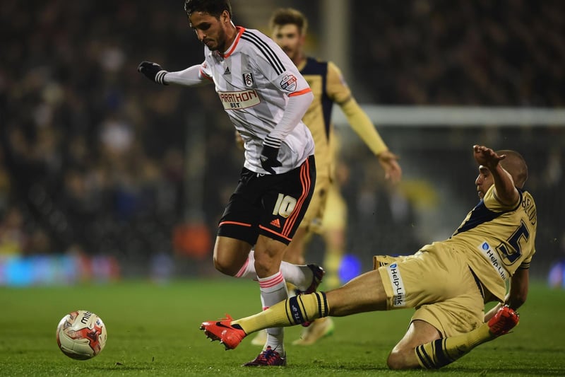 Giuseppe Bellusci tackles Fulham's Bryan Ruiz.