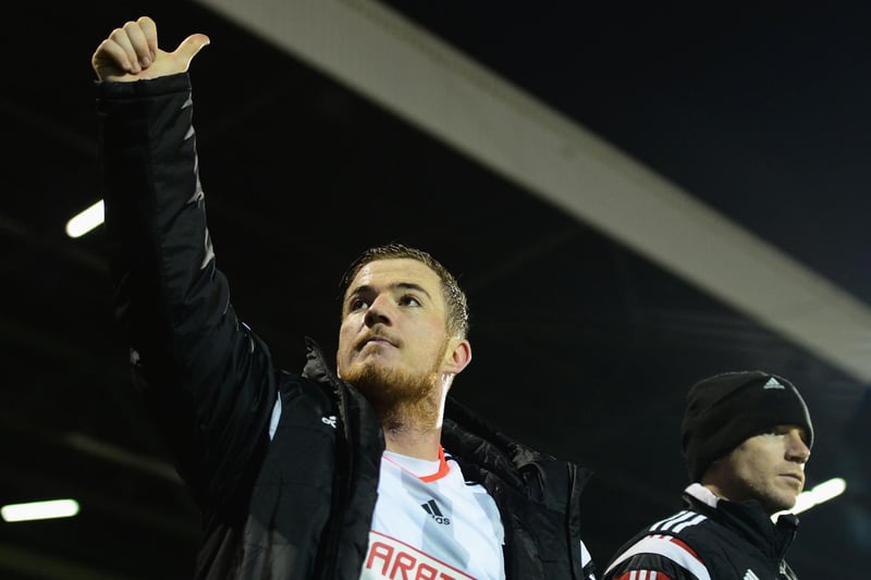 Former Leeds United striker Ross McCormack acknowledges the travelling faithful at full-time.