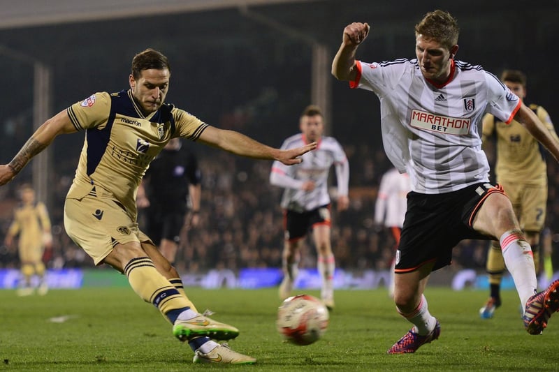 Billy Sharp's shot is blocked by Fulham's Michael Turner.
