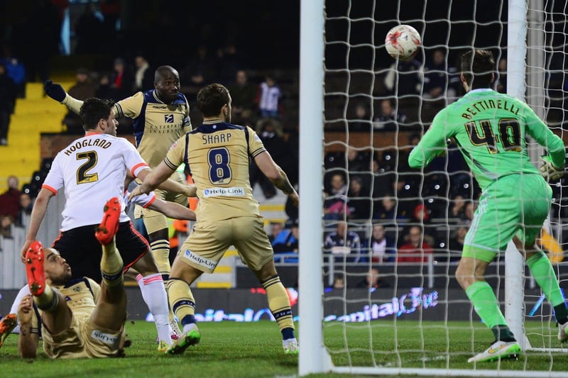 Sol Bamba heads home Leeds United's second goal past Fulham goalkeeper Marcus Bettinelli.