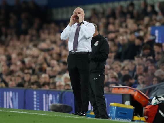 Sean Dyche, Manager of Burnley gives their team instructions during the Premier League match between Everton and Burnley at Goodison Park on September 13, 2021 in Liverpool, England.