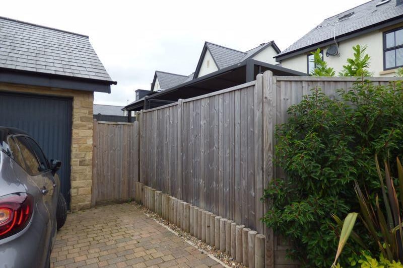 Guidem Park, Lancaster. A garage and parking space at the property. Picture courtesy of Lancastrian Estates.
