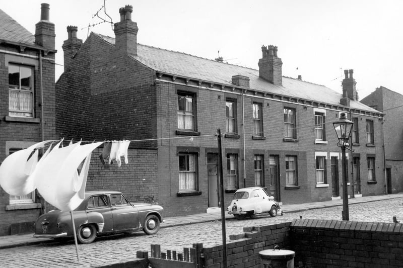 Chester Terrace in September 1964. Pictured are four back-to-back terraced houses flanked by yards originally built to house the shared outside toilets.
