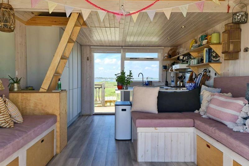 According to Denisons the hut is "above average size" and enjoys dual aspect of both the beach and harbour, which is why it has such a hefty price tag.