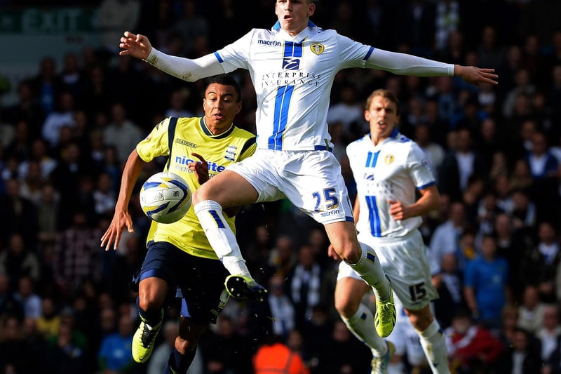 Sam Byram holds off Birmingham City's Jesse Lingard during the Championship clash at Elland Road in October 2013.