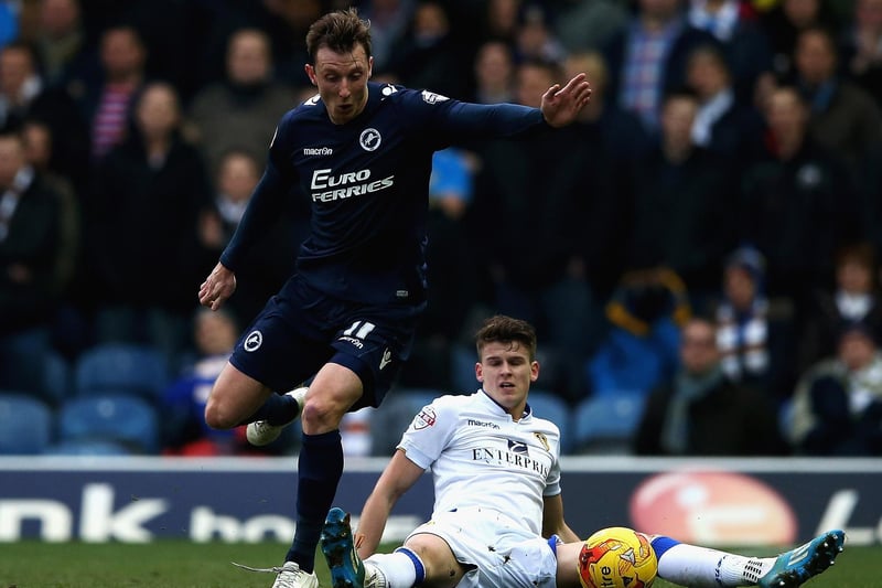 Sam Byram tackles Milwall's Martyn Woolford during the Championship clash at Elland Road in February 2015.