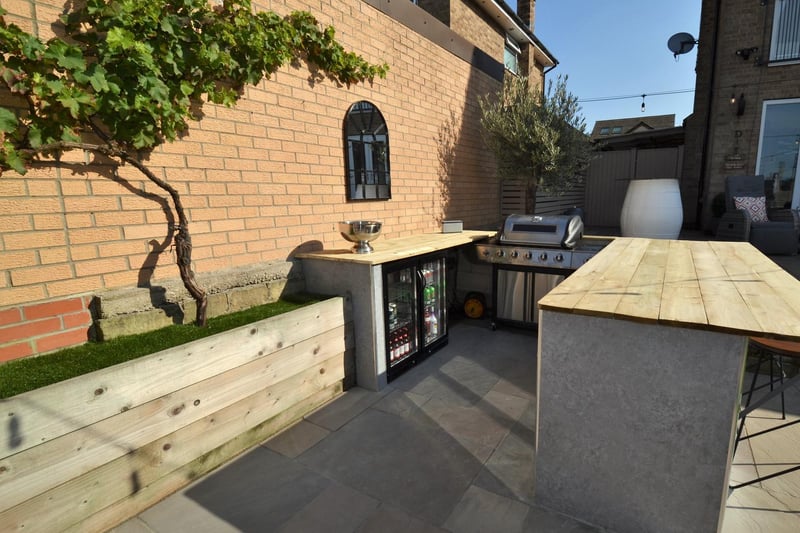 An outdoor kitchen is ideal for entertaining friends and family.