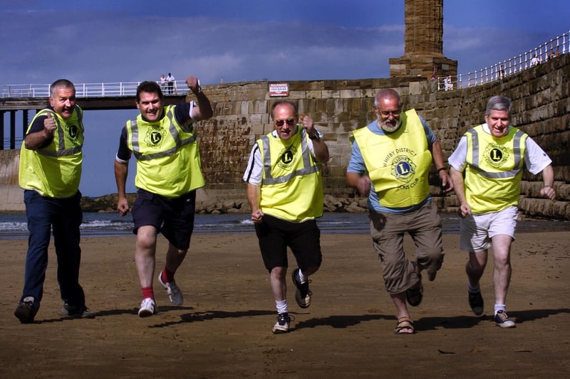 Whitby Lions organise a fun run on the beach to raise funds for the air ambulance.