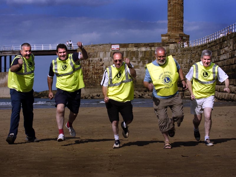 Whitby Lions organise a fun run on the beach to raise funds for the air ambulance.