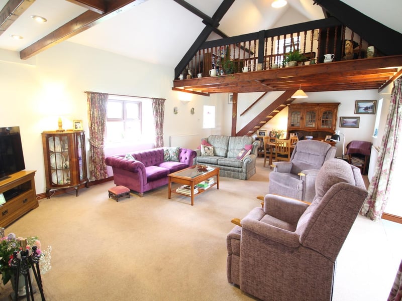 The light and bright sitting room with diner and mezzanine.