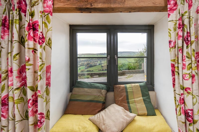 A window seat makes the most of the stunning landscape outside.