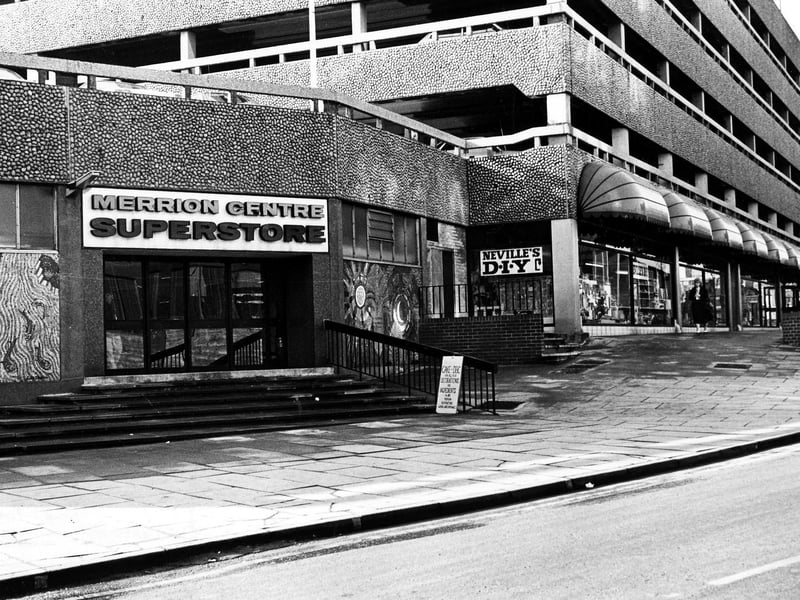 Merrion Centre from Merrion Way in February 1985. On the left is the Merrion Centre Superstore, an indoor retail market. To the right of this is Neville's D-I-Y.