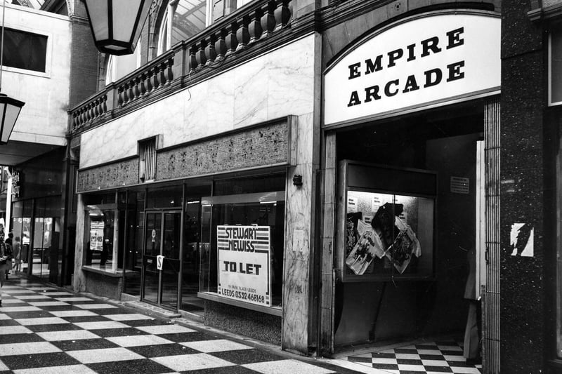 June 1984 and pictured is The Cross Arcade between Queen Victoria Street and King Edward Street showing the rear entrance to the Empire Arcade.