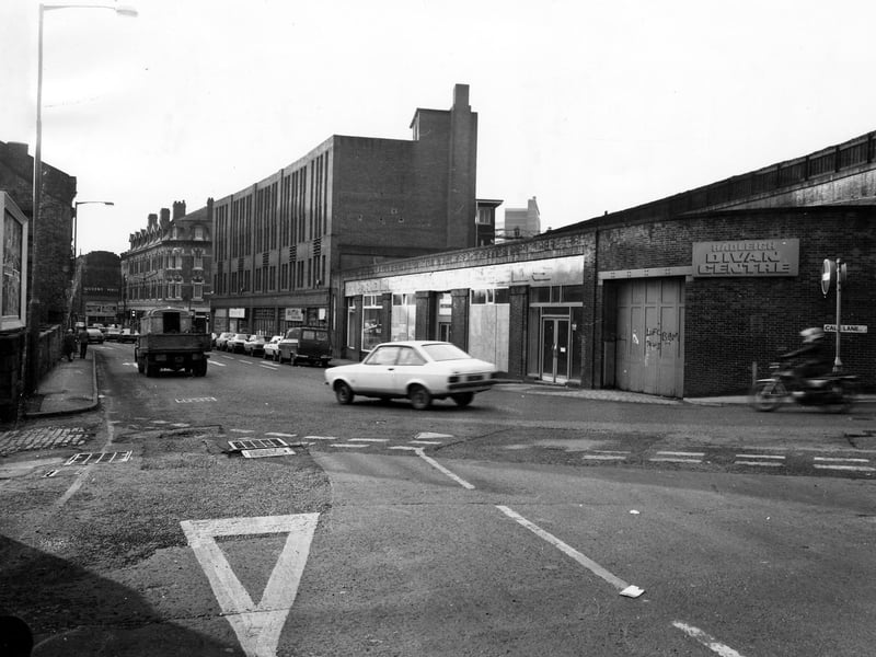 Call Lane seen from the junction with The Calls in November 1980. On the right is formerly Hadleigh of Leeds, upholstery and bedding. Next to this is Mottek International; and further along is the junction with Briggate, then the Golden Lion pub. In the distance on the left is the Queen's Hall.