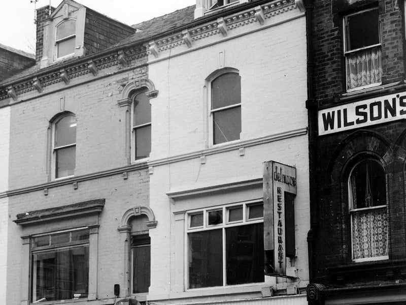 New Briggate in August 1984. Pictured, from left, is Adel Properties, estate agents, The Alternative, restaurant and take-away, and The Art Centre, with Wilson Hotel above.